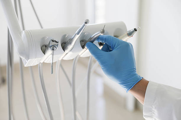 Professional Tooth Extraction technician working in Wesley Chapel, NC